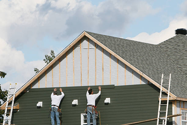 Professional Vinyl Siding technician working in Paxinos, PA